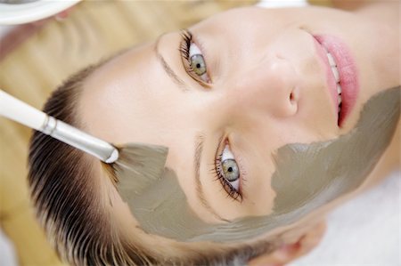 facial mask brush - young woman is having a mudmask applied to her face Stock Photo - Budget Royalty-Free & Subscription, Code: 400-04076877