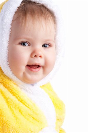 simsearch:400-05130009,k - Smiling baby girl in yellow hood, isolated Stock Photo - Budget Royalty-Free & Subscription, Code: 400-04079824