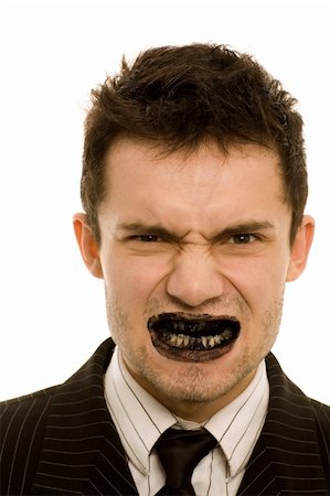 Angry man with black teeth Stock Photo - Budget Royalty-Free & Subscription, Code: 400-04070438