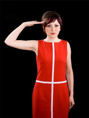 Saluting petite young woman in red dress Stock Photo - Budget Royalty-Free & Subscription, Code: 400-04070460