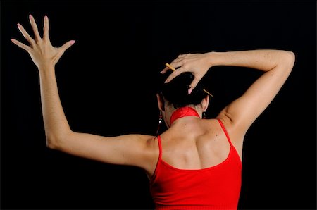 Portrait of passionate flamenco dancer isolated on black Stock Photo - Budget Royalty-Free & Subscription, Code: 400-04070474