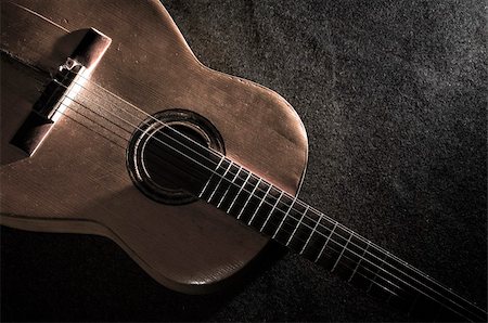 shadow acoustic guitar - Still life with old acoustic guitar Stock Photo - Budget Royalty-Free & Subscription, Code: 400-04070477