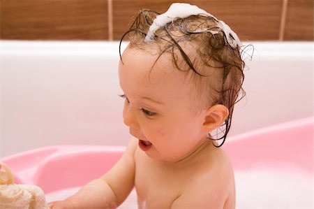 sweet and happy baby girl in bathroom Stock Photo - Budget Royalty-Free & Subscription, Code: 400-04071604