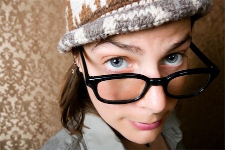 Closeup of Cute Nerdy Woman in a Knit Cap Stock Photo - Budget Royalty-Free & Subscription, Code: 400-04072370