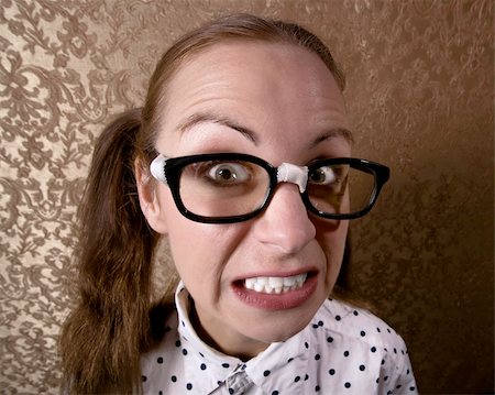 Wide Angle Portrait of a Nervous Nerdy Girl Stock Photo - Budget Royalty-Free & Subscription, Code: 400-04072582