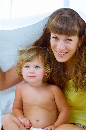 simsearch:400-04165323,k - High key portrait of happy mother with baby Photographie de stock - Aubaine LD & Abonnement, Code: 400-04072652