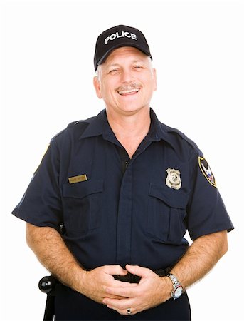 Friendly, jovial police officer isolated against a white background. Photographie de stock - Aubaine LD & Abonnement, Code: 400-04073020
