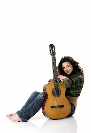 simsearch:400-04921650,k - Beautiful woman isolated on white playing music with a guitar Stock Photo - Budget Royalty-Free & Subscription, Code: 400-04073042