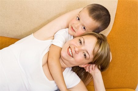 Boy hugging his mother Stock Photo - Budget Royalty-Free & Subscription, Code: 400-04073104