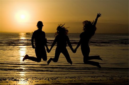 A silhouette of girls jumping in water. Stock Photo - Budget Royalty-Free & Subscription, Code: 400-04073147