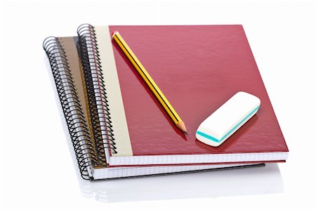 simsearch:400-03912552,k - Pencil and eraser on a two notebooks reflected on white background. Shallow depth of field Stockbilder - Microstock & Abonnement, Bildnummer: 400-04073278