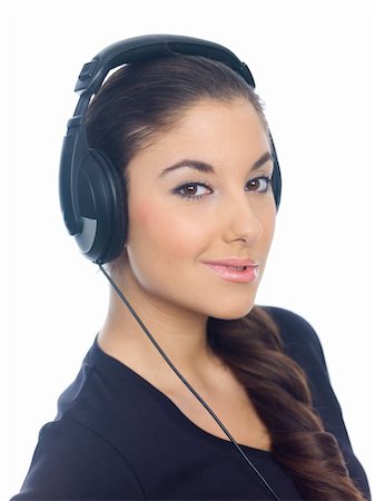 Beautiful young lady is liten to the music, isolated Foto de stock - Super Valor sin royalties y Suscripción, Código: 400-04073771