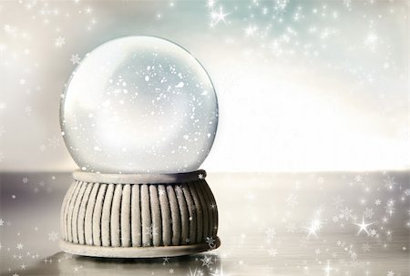 simsearch:400-05674130,k - Snow globe against a silver background Photographie de stock - Aubaine LD & Abonnement, Code: 400-04073876