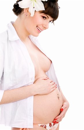 Happy pregnant woman on isolated white Foto de stock - Royalty-Free Super Valor e Assinatura, Número: 400-04084654