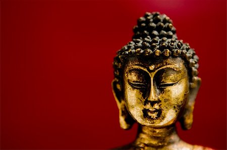 simsearch:400-05099216,k - Buddha statue in a meditation position with a zen state of mind Stock Photo - Budget Royalty-Free & Subscription, Code: 400-04084981