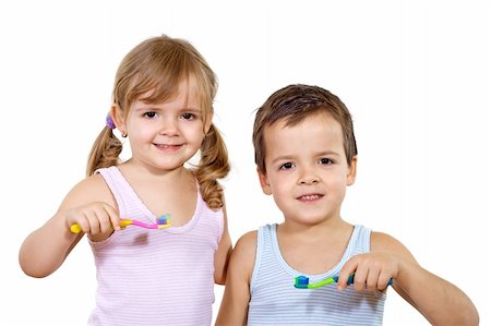 Kids - boy and girl - with toothbrush - isolated Stock Photo - Budget Royalty-Free & Subscription, Code: 400-04085082