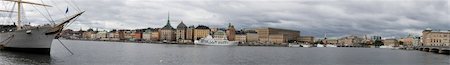 scandinavian blue house - Ship fore an panorama of Stockholm city in background Stock Photo - Budget Royalty-Free & Subscription, Code: 400-04086985