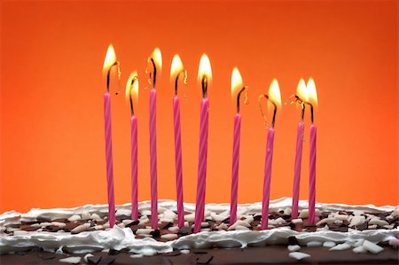 simsearch:400-04291488,k - Some lit birthday candles close up Stock Photo - Budget Royalty-Free & Subscription, Code: 400-04089854