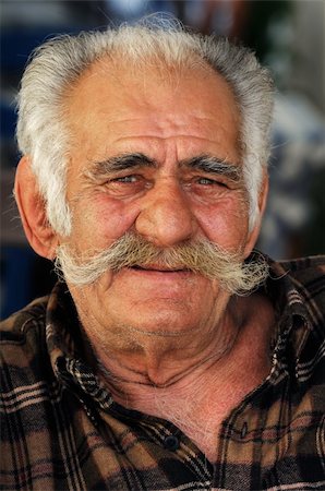 Portrait image of a senior Greek male with a big mustache looking at the camera Stock Photo - Budget Royalty-Free & Subscription, Code: 400-04080264