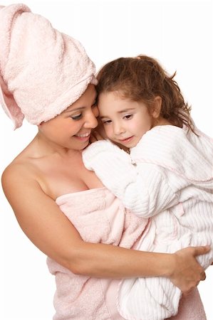 Caring nurturing mother cuddles her daughter at bathtime Stock Photo - Budget Royalty-Free & Subscription, Code: 400-04080727