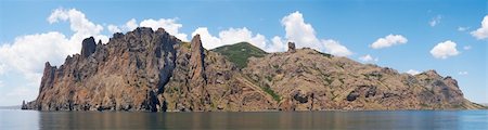 simsearch:400-05678506,k - The view on Karadag rock (reserve on place of ancient extinct volcano) from the side of a excursion ship (Crimea, Ukraine). Eight shots stitch image. Stockbilder - Microstock & Abonnement, Bildnummer: 400-04080912