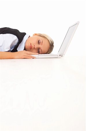 simsearch:400-04008684,k - Very tired Businesswoman sleeping on her laptop while lying down on the floor Stockbilder - Microstock & Abonnement, Bildnummer: 400-04081353