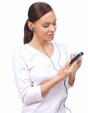 Beautiful young lady is listen to the music, isolated Foto de stock - Super Valor sin royalties y Suscripción, Código: 400-04082559