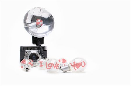 simsearch:400-04527928,k - Valentine flash bulbs with"I Love You" and old camera. Foto de stock - Super Valor sin royalties y Suscripción, Código: 400-04082630
