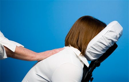 simsearch:400-04837545,k - A woman getting a chair massage Stock Photo - Budget Royalty-Free & Subscription, Code: 400-04082769