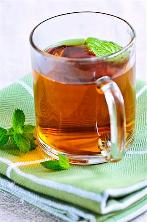 simsearch:400-06554630,k - Cup of fresh herbal mint tea with peppermint leaves Stock Photo - Budget Royalty-Free & Subscription, Code: 400-04083786