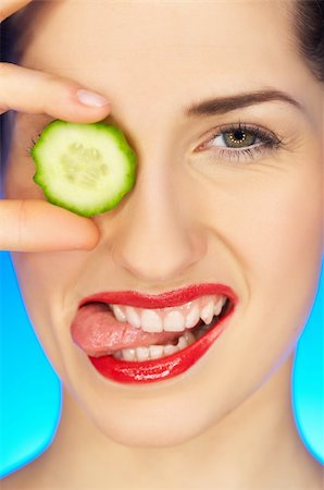 simsearch:400-04083912,k - Portrait of beautiful woman with cucumber slice Stock Photo - Budget Royalty-Free & Subscription, Code: 400-04083885