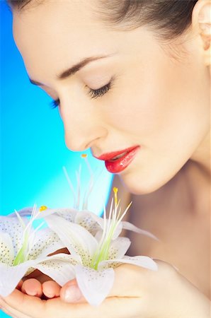 simsearch:400-04083912,k - Portrait of beautiful woman holding flowers in hands Stock Photo - Budget Royalty-Free & Subscription, Code: 400-04083895