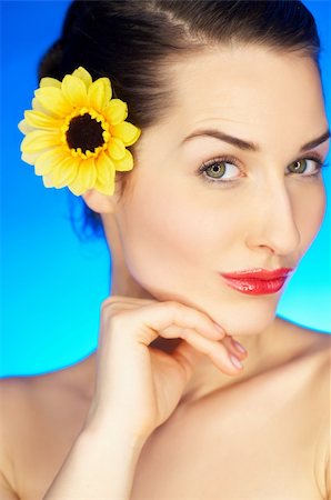 simsearch:400-04083912,k - Portrait of beautiful woman with sunflower in hair Stock Photo - Budget Royalty-Free & Subscription, Code: 400-04083899