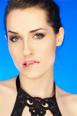 simsearch:400-04320148,k - Portrait of beautiful woman bites her lip Photographie de stock - Aubaine LD & Abonnement, Code: 400-04083918
