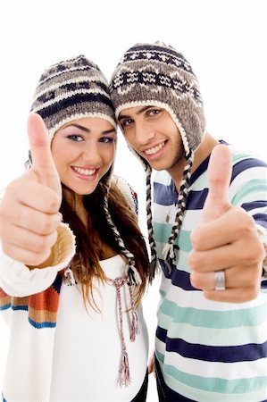 simsearch:400-04585942,k - pleased friends with thumbs up against white background Photographie de stock - Aubaine LD & Abonnement, Code: 400-04095366