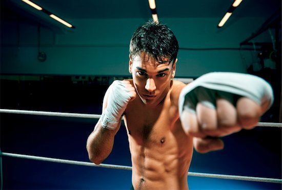 young adult man boxing in gym. Copy space Stock Photo - Royalty-Free, Artist: diego_cervo, Image code: 400-04095561