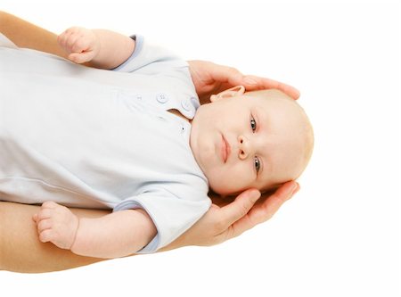 simsearch:400-05258814,k - baby in parent's hands over white Stock Photo - Budget Royalty-Free & Subscription, Code: 400-04095586