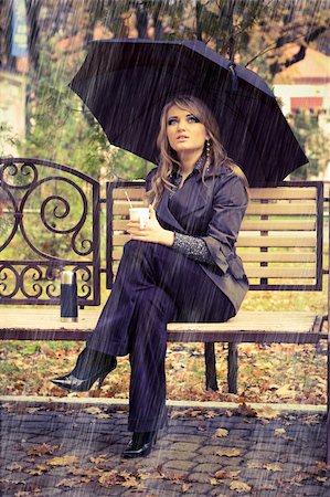 suricoma (artist) - Girl with umbrella sitting on bench at autumn park. it's raining Stock Photo - Budget Royalty-Free & Subscription, Code: 400-04096910