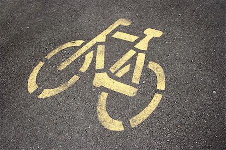 simsearch:700-01259859,k - Bicycle road sign painted on the asphalt surface Stock Photo - Budget Royalty-Free & Subscription, Code: 400-04097456