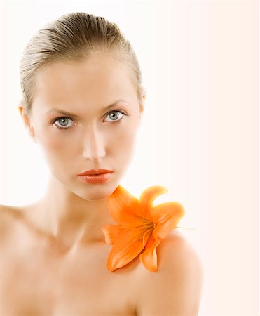 simsearch:400-04323317,k - great portrait of a blond girl with wet hair and an orange lily on her shoulder Stock Photo - Budget Royalty-Free & Subscription, Code: 400-04097982