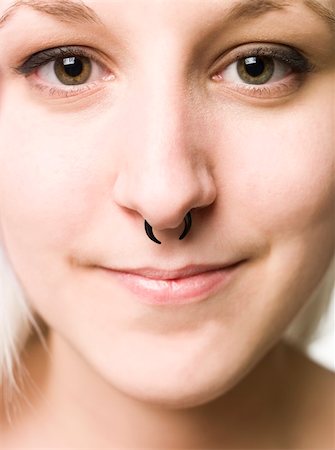 Close up of a face with piercing Photographie de stock - Aubaine LD & Abonnement, Code: 400-04098324