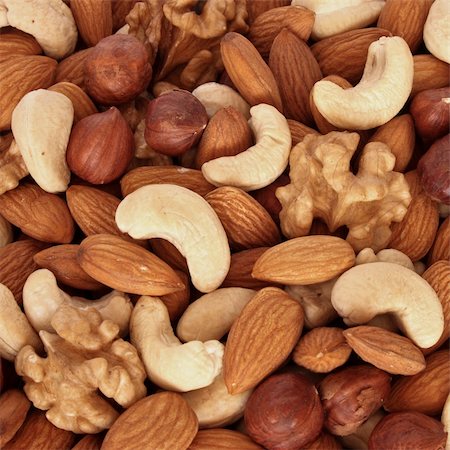 simsearch:400-04377067,k - Assorted nuts (almonds, filberts, walnuts, cashews) close up Stock Photo - Budget Royalty-Free & Subscription, Code: 400-04099357
