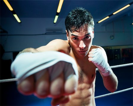 simsearch:400-08333281,k - young adult man boxing in gym. Copy space Stock Photo - Budget Royalty-Free & Subscription, Code: 400-04093532