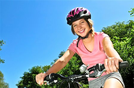 simsearch:400-04890875,k - Portrait of a teenage girl on a bicycle in summer park outdoors Stock Photo - Budget Royalty-Free & Subscription, Code: 400-04093552