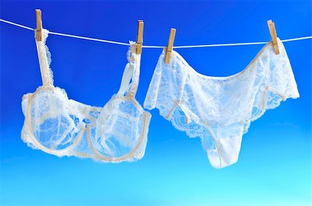 Sexy lace lingerie hanging on clothes line Stock Photo - Budget Royalty-Free & Subscription, Code: 400-04093694