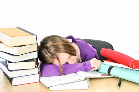 sleeping in a classroom - Teenage girl studying at the desk being tired Foto de stock - Super Valor sin royalties y Suscripción, Código: 400-04093748