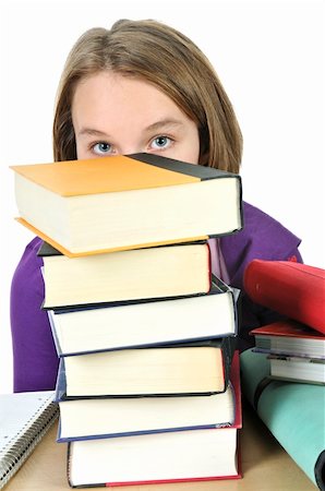 Frustrated teenage girl studying at the desk with big stack of books Stock Photo - Budget Royalty-Free & Subscription, Code: 400-04093742