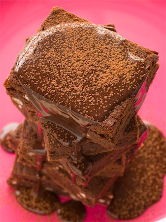 Chocolate Fudge Brownie With Chocolate Fudge Sauce Photographie de stock - Aubaine LD & Abonnement, Code: 400-04105834