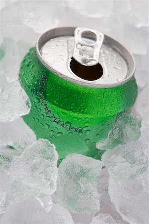 Green Can Of Fizzy Soft Drink Set In Ice With The Ring Pulled Stock Photo - Budget Royalty-Free & Subscription, Code: 400-04105939