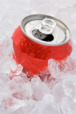 Red Can Of Fizzy Soft Drink Set In Ice With The Ring Pulled Stock Photo - Budget Royalty-Free & Subscription, Code: 400-04105942